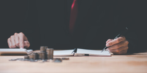 Aufkleber - Accountant calculating numbers in company financial documents with calculator ,Planning to assess and review the budget ,concept of finance and investment ,financial responsibilities