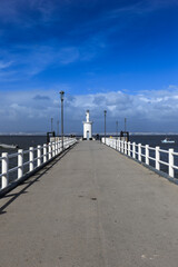 Wall Mural - Lighthouse at the end of a jetty in Alcochete town