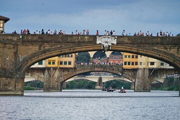 Wall Mural - Bridges on the Arno river seen by a boat in Florence, Tuscany, Italy