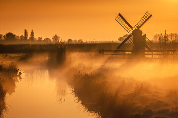 Morning at Zaanse Schans in the Netherlands - it is one of the most beautifully located open-air museums in Europe. Here we will find classic Dutch buildings.