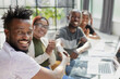 © Katsiaryna - Business handshake in the office. african american team