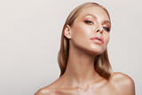 Beauty portrait of model with natural make-up. Fashion shiny highlighter on skin, sexy gloss lips make-up
