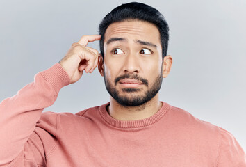 Aufkleber - Thinking, question and doubt with a man in studio on a gray background looking thoughtful or contemplative. Confused, idea and memory with a young asian male trying to remember but feeling unsure
