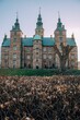 Vertical shot of the beautiful architecture of the Rosenborg castle located in Copenhagen, Denmark