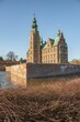 Vertical shot of the beautiful architecture of the Rosenborg castle located in Copenhagen, Denmark