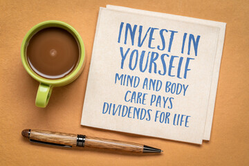 Poster - Invest in yourself. Mind and body care pays dividends for life. Inspirational advice or reminder on a napkin, self care concept.