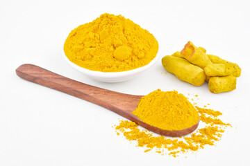 Wall Mural - Turmeric powder with raw turmeric isolated on white background