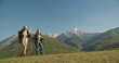 © andreybiling - Mature caucasian couple on vacation, having a hike in spring mountains, spending time together after retirement together travelling - tourism, pension concept