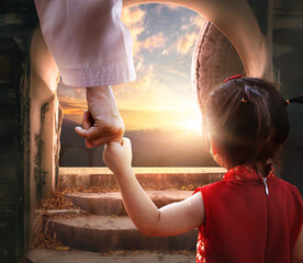 Sticker - Easter and Good Friday concept, Jesus holding child's hand with empty tomb of Jesus Christ at sunset background