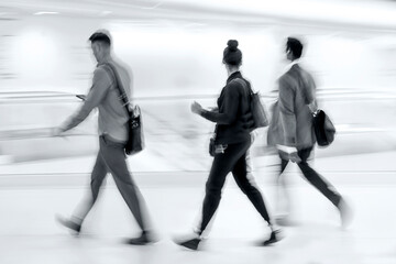 Wall Mural - group of people in the lobby business center in monochrome tonality