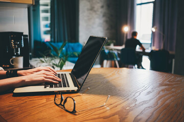 man and woman working with contemporary laptops.