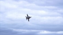 F:A-18F Super Hornet In Flight Against Cloudy Sky - Low Angle