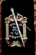 The 4 sephardic synagogues, Jerusalem old city, Israel. Torah scroll in sash and yad.