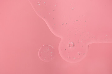 Poster - pink background with transparent bubbles serum