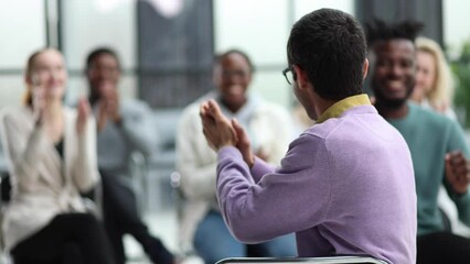 Wall Mural - Seminar business meeting applause speaker. Crowded smiling audience clapping person speech.