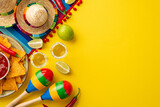 Fototapeta Mapy - Cinco-de-mayo celebration concept. Top view photo of nacho chips salsa sauce chilli tequila with salt lime sombrero hats colorful serape and maracas on isolated bright yellow background with copyspace