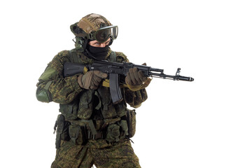 Wall Mural - Cropped photo of a russian mercenary soldier with AK-74 in his hand and aiming in enemy.