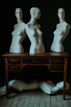 Mannequin Figurines Placed On Vintage Table