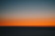 © Scott Snyder/Stocksy - Motion Blurred Sunset over Ocean