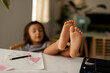 © Valentina Barreto/Stocksy - little girl feet
