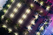 © YiChao Ma/Stocksy - Top view of car parking lot