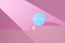 Hello On Blue Circle Sign On Color Podium