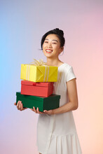 Pretty Woman Hands Many Presents Wrapped In Color Paper