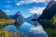 © James Fulton/Stocksy - Mountains reflecting in clear water