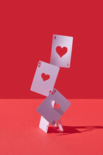 Ace, King And Queen Cards With Cut Heart Hollows.