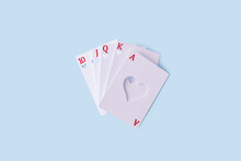 White Deck Of Cards With Cut Hearts Inside.