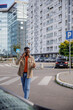 © Jovo Jovanovic/Stocksy - Entrepreneur on a phone call while walking in city