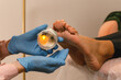 © Alina Hvostikova/Stocksy - Feet massage treatment with wax candle