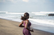 © Jovo Jovanovic/Stocksy - Woman running on the beach outdoor workout