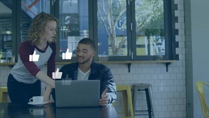 Poster - Animation of thumbs up icons over diverse coworkers discussing report on laptop at office