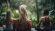 © ReisMedia - Girls making yoga in the lotus position. Tropical background