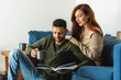 © Leonardo Borges Nuñez/Stocksy - Couple enjoying a cup of coffee at home.