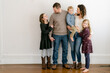 © Léa Jones/Stocksy - Happy & loving family of five.