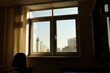 © Olga Murzaeva/Stocksy - window in the office