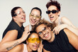 © María Soledad Kubat/Stocksy - Happy young adult group of friends youth culture concept
