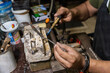 © Luis Velasco/Stocksy - Close Up Of Anonymous Jeweler Soldering A Ring