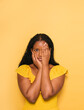 © Hernandez & Sorokina/Stocksy - Woman Wearing Yellow Clothes In Yellow Background