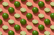Seamless pattern of lime slices on a red background