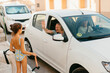 © Jimena Roquero/Stocksy - Kid and dog waving goodby to grandparents leaving in white car