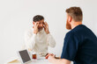 © Studio Firma/Stocksy - Doctor Examining Senior Man