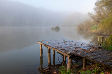Autumn Scene With Foggy Lake