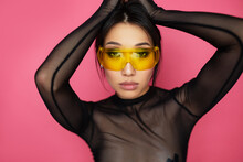 Stylish Asian Woman In Yellow Sunglasses
