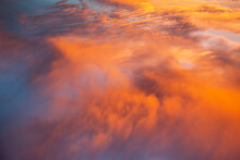 Dramatic Orange Clouds In The Blue Sky At Sunset