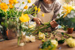 © Santi Nuñez/Stocksy - Unrecognizable florist making beautiful bouquet of fresh flowers