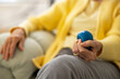 © Raymond Forbes LLC/Stocksy - Senior at Home Doing Physical Therapy of hand with ball