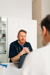 © Studio Firma/Stocksy - Doctor Examining Senior Man